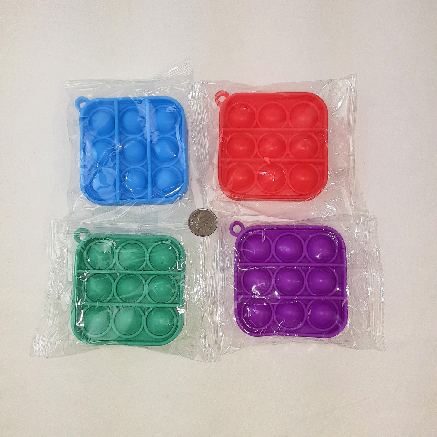 Item# 1800 - 9 BUTTON POPIT - $1.00 ea | SRP $4.99 - 6 / case